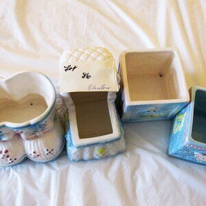 Four Ceramic Flower Pots.